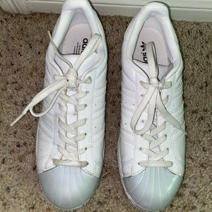 Adidas shoes I wore them once.